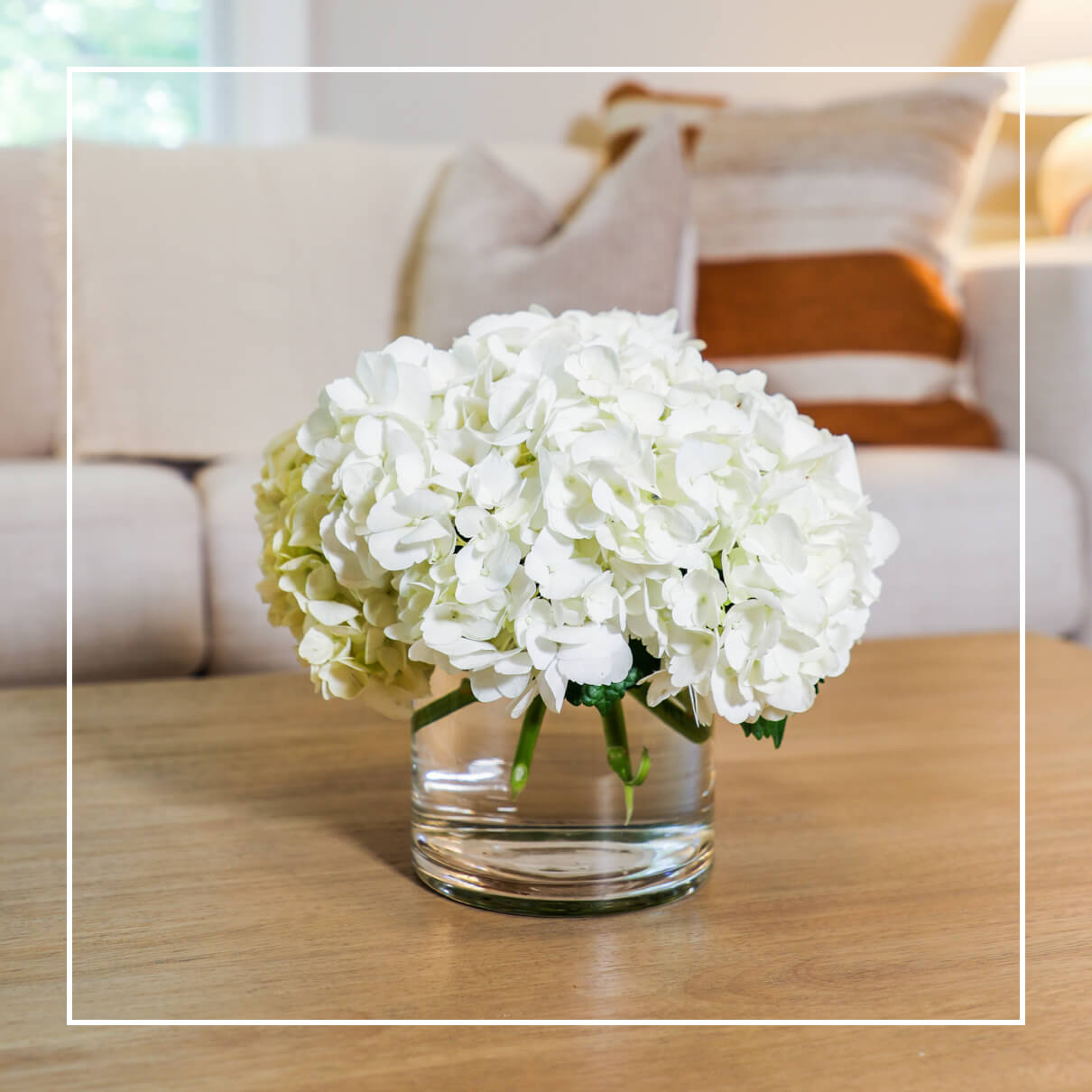 White lowers on table | Roots to Stillness